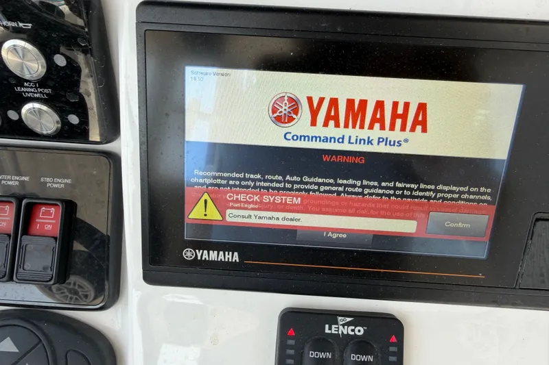 Slide: The Image of Yamaha Command Link Plus warning screen on 2021 Caymas 341 CC boat dashboard. - 54