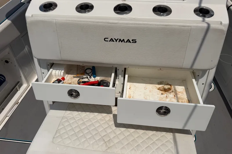 Slide: The Image of 2021 Caymas 341 CC boat storage drawers with tools and accessories. - 57