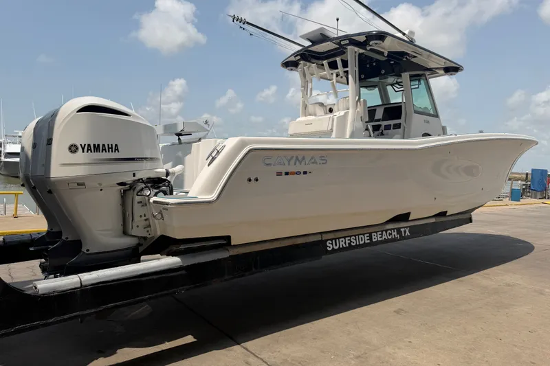 Slide: The Image of 2021 Caymas 341 CC boat with Yamaha engine on trailer at Surfside Beach, TX. - 7