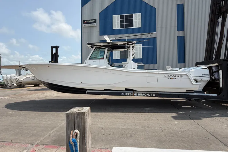 The Image of 2021 Caymas 341 CC boat on trailer at service center, Surfside Beach, TX. - 1