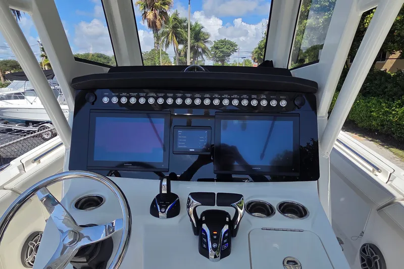 Slide: The Image of Helm of 2025 World Cat 260 CC-X with modern controls and dual displays. - 47