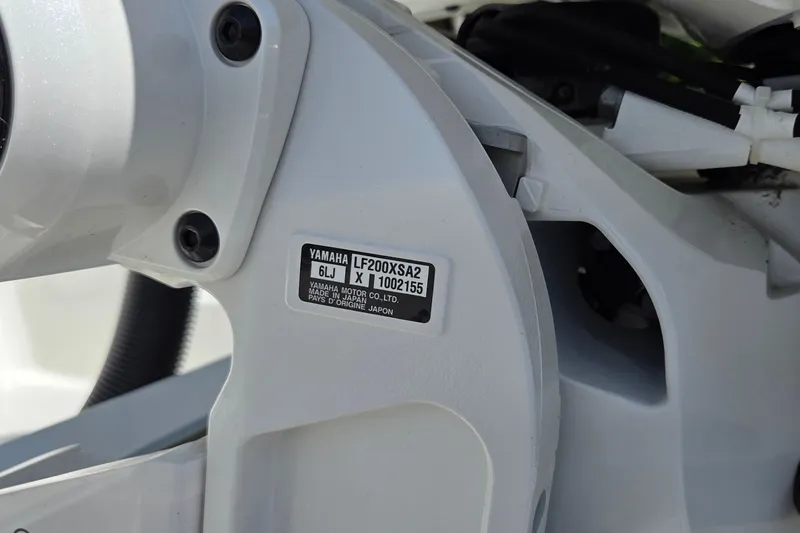 Slide: The Image of Close-up of Yamaha LF200XSA2 engine part on 2025 World Cat 260 CC-X boat. - 51