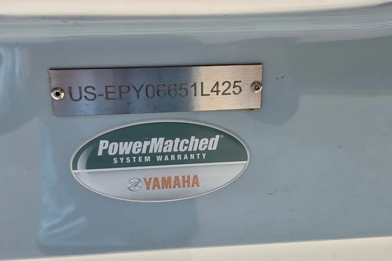 Slide: The Image of 2025 World Cat 260 CC-X boat with Yamaha PowerMatched system warranty label. - 50