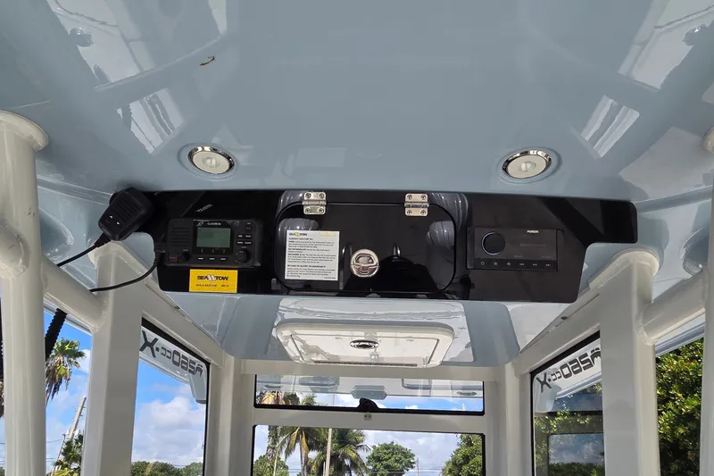 Slide: The Image of Interior view of 2025 World Cat 260 CC-X boat console with electronic controls. - 48