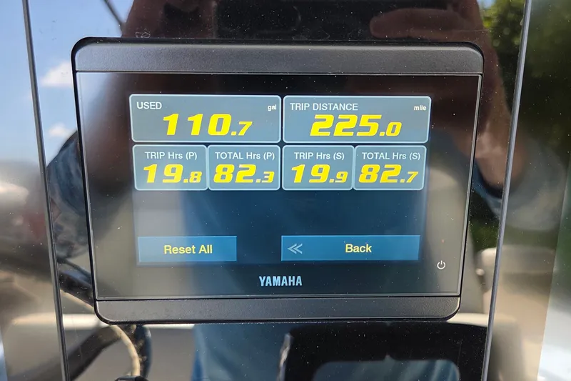 Slide: The Image of Yamaha display showing fuel usage and trip data on 2025 World Cat 260 CC-X. - 44