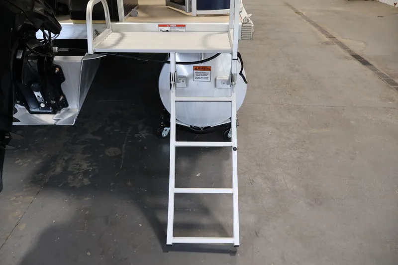 Slide: The Image of Rear view of a 2012 Bennington 2075 GS boat ladder and platform. - 44