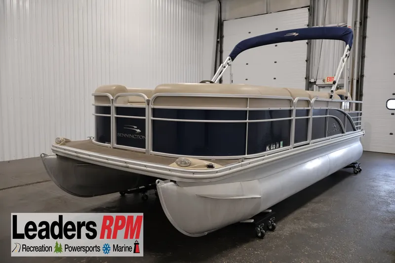 The Image of 2012 Bennington 2075 GS pontoon boat in indoor showroom setting. - 1
