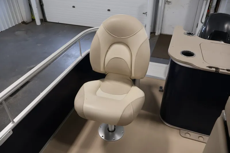 Slide: The Image of Beige captain's chair on 2012 Bennington 2075 GS pontoon boat interior. - 38