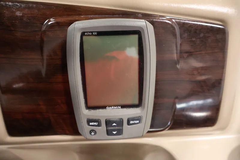 Slide: The Image of Garmin Echo 100 fishfinder on 2012 Bennington 2075 GS boat dashboard. - 29