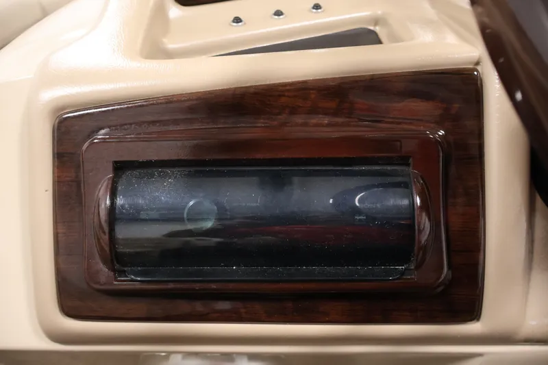 Slide: The Image of Dashboard detail of a 2012 Bennington 2075 GS boat with wood trim accents. - 30