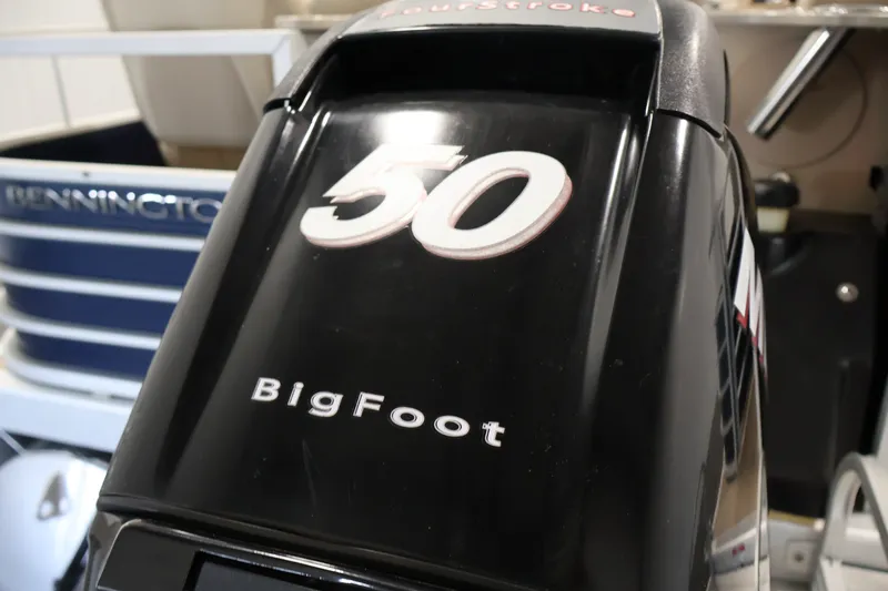 Slide: The Image of Outboard motor on a 2012 Bennington 2075 GS boat, featuring "BigFoot" branding. - 45