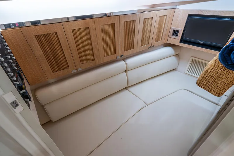 Slide: The Image of Manufacturer Provided Image: Interior of 2026 Grady-White Freedom 345 yacht with elegant upholstery. - 18