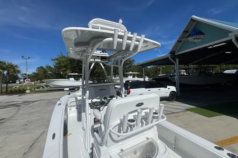 Slide: The Image of 2025 BlackJack 256 Coastal boat at a marina, featuring a sleek design and modern equipment. - 38