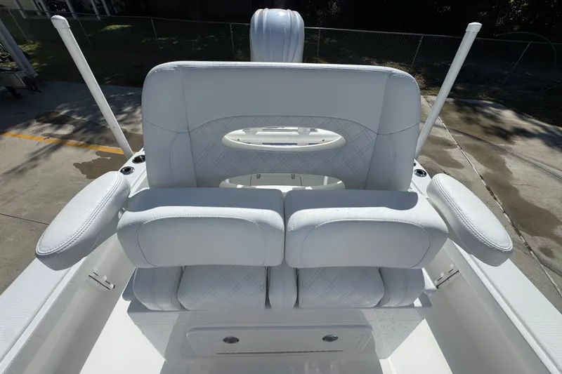 Slide: The Image of Luxurious seating on 2025 BlackJack 256 Coastal boat, featuring white cushioned design. - 30