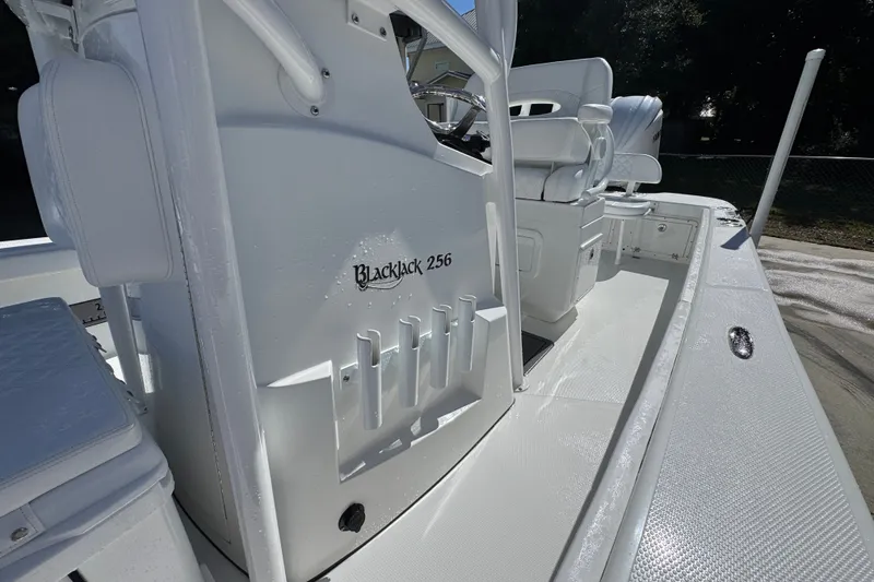 Slide: The Image of 2025 BlackJack 256 Coastal boat interior, showcasing sleek design and seating arrangement. - 23