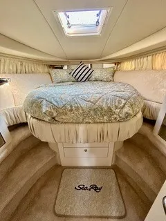 Slide: The Image of The image shows a cozy cabin with a large bed and a skylight. - 20