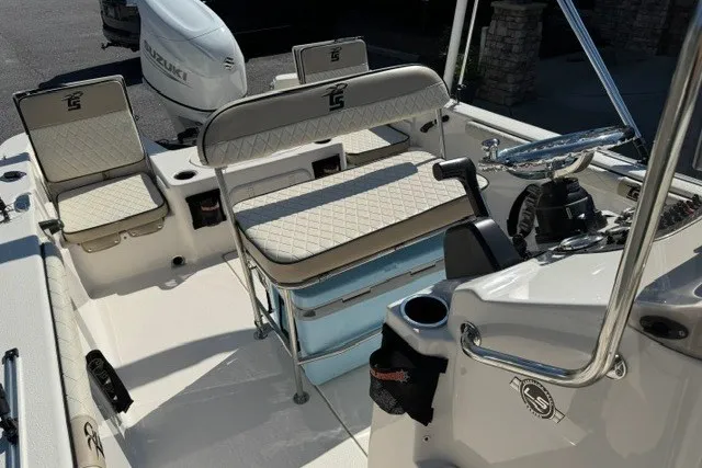 Slide: The Image of 2021 Carolina Skiff 19 LS boat interior with seating and steering console. - 11