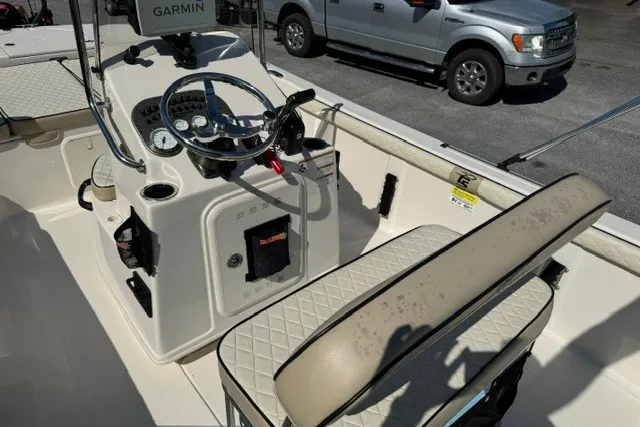 Slide: The Image of 2021 Carolina Skiff 19 LS boat interior with steering console and seating. - 13