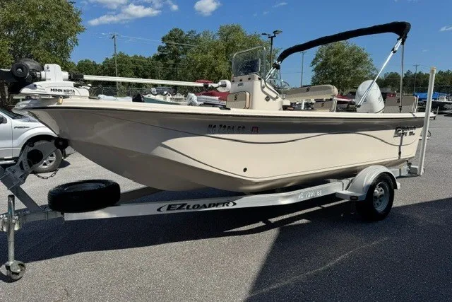 Slide: The Image of 2021 Carolina Skiff 19 LS boat on EZ Loader trailer, parked outdoors. - 3