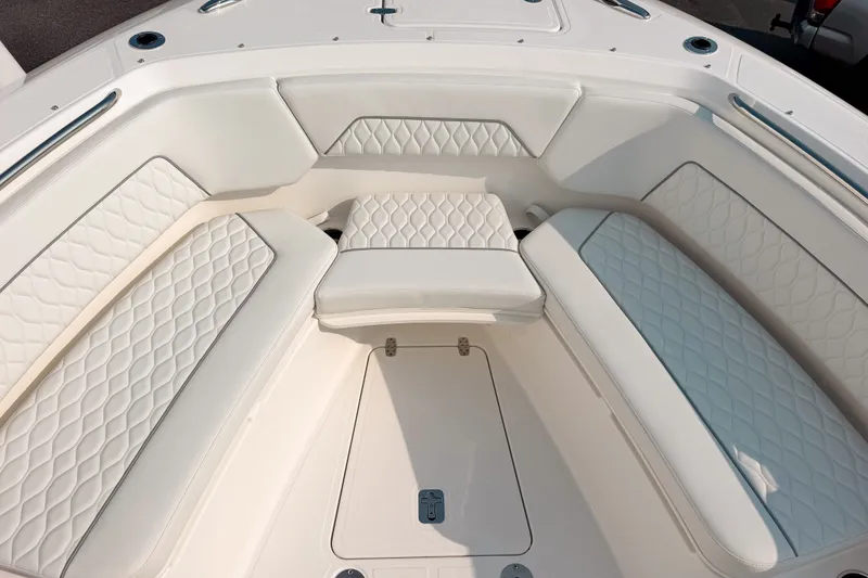Slide: The Image of Luxurious seating area on 2027 Pursuit S 328 Sport boat with quilted upholstery. - 19