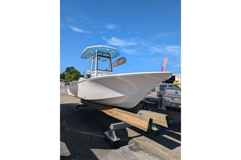 Slide: The Image of 2027 Tidewater 2500 Carolina Bay boat displayed outdoors on a sunny day. - 3