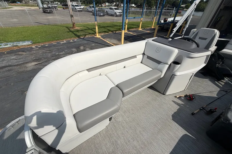 Slide: The Image of 2023 Godfrey Sweetwater 2086 CX pontoon boat interior with gray and white seating. - 8