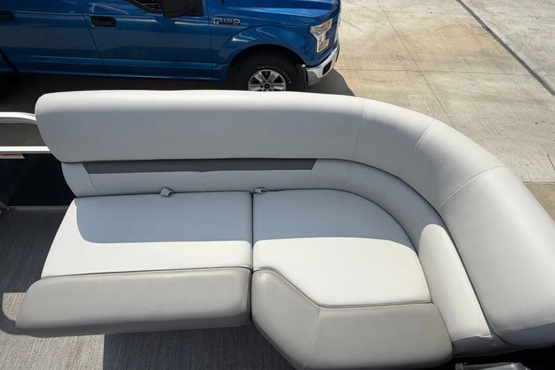 Slide: The Image of 2023 Godfrey Sweetwater 2086 CX boat seating with light gray upholstery. - 9