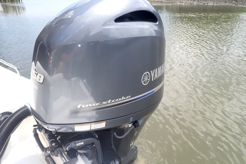 Slide: The Image of Yamaha four-stroke outboard motor on 2017 Sea Hunt Ultra 211 boat. - 43