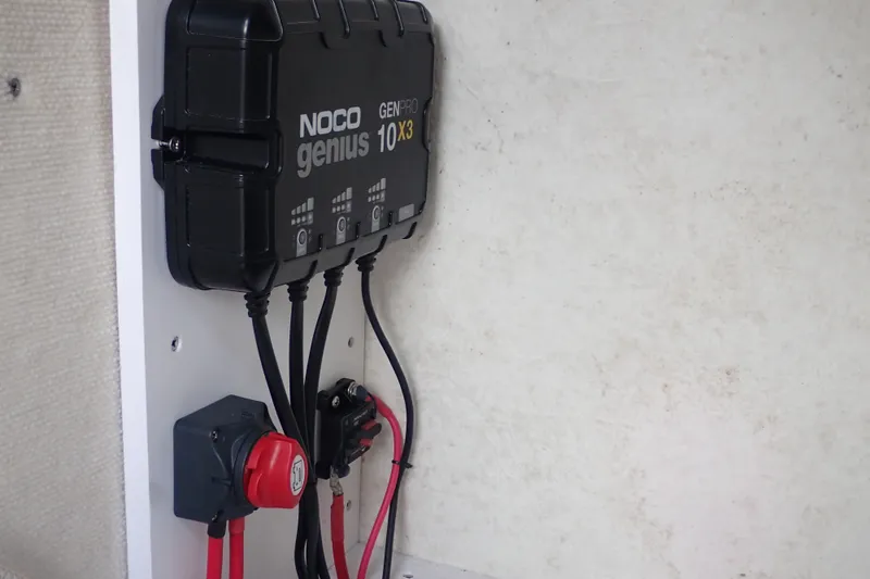 Slide: The Image of NOCO Genius GENPRO 10 X3 charger installed on 2017 Sea Hunt Ultra 211 boat. - 39