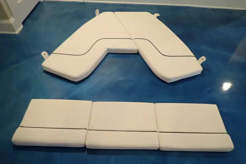 Slide: The Image of Cushion set for 2017 Sea Hunt Ultra 211 boat on blue floor. - 53