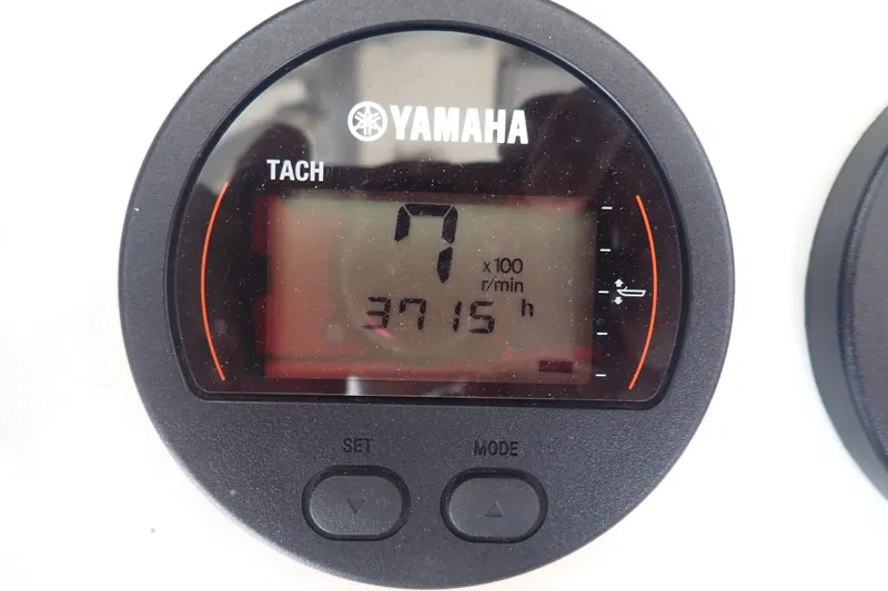 Slide: The Image of Yamaha tachometer displaying 3715 hours on a 2017 Sea Hunt Ultra 211 boat. - 26