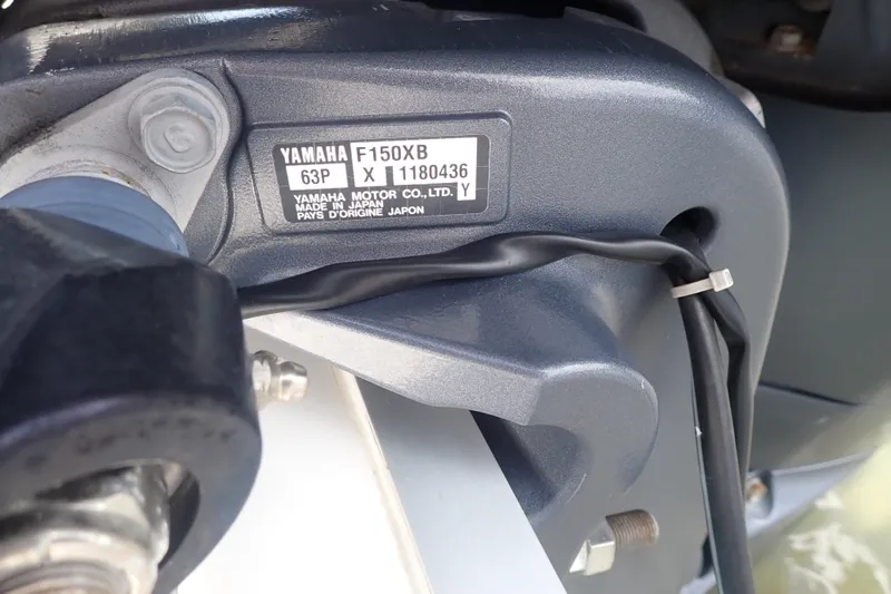 Slide: The Image of Yamaha F150XB engine on 2017 Sea Hunt Ultra 211 boat, close-up view. - 44