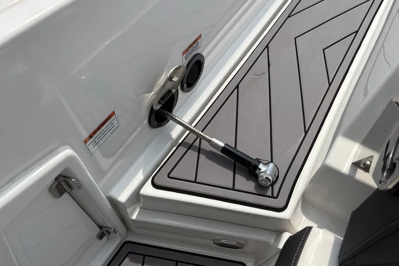 Slide: The Image of 2023 Monterey 298SS Super Sport boat deck with sleek design and hardware details. - 31