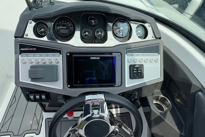 Slide: The Image of Dashboard of 2023 Monterey 298SS Super Sport boat with advanced controls and navigation system. - 16