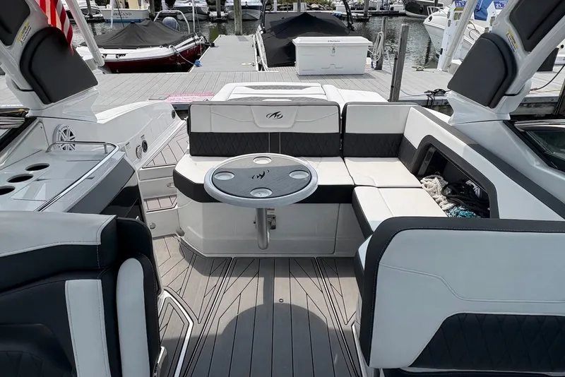 Slide: The Image of 2023 Monterey 298SS Super Sport boat interior with sleek seating and modern design. - 19