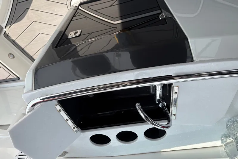 Slide: The Image of 2023 Monterey 298SS Super Sport boat interior with sleek design and chrome accents. - 28