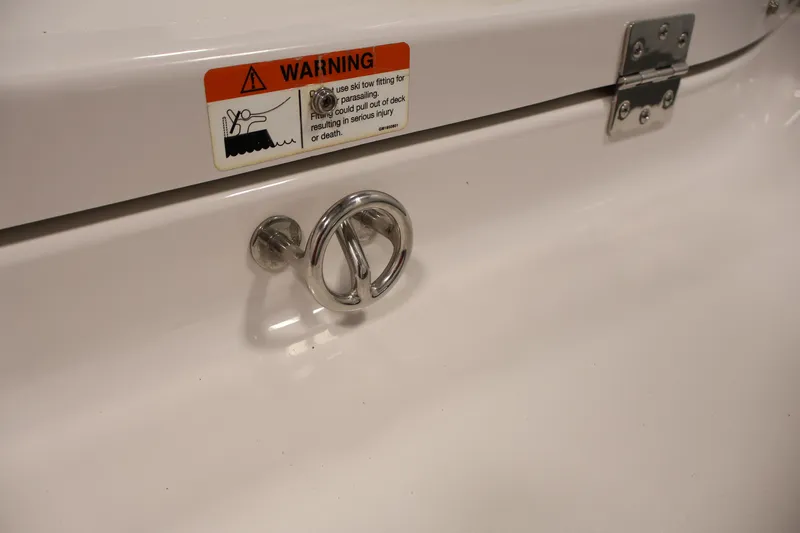 Slide: The Image of 2017 Scarab 165 G boat warning label and metal fitting detail. - 29