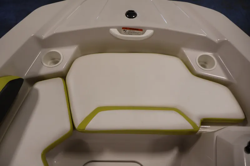 Slide: The Image of 2017 Scarab 165 G boat interior seating with cup holders and white upholstery. - 11