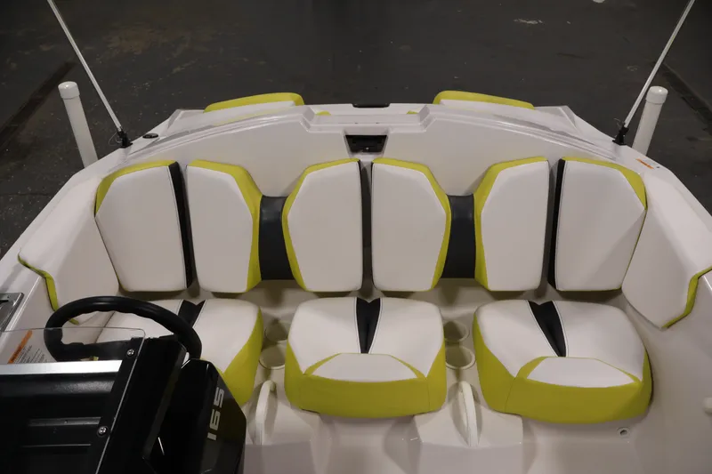 Slide: The Image of 2017 Scarab 165 G boat interior with white and green seating arrangement. - 23