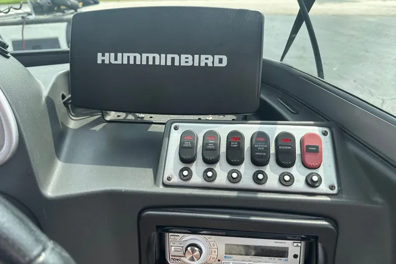Slide: The Image of Control panel of a 2013 Alumacraft Competitor 185 Sport boat with Humminbird display. - 15