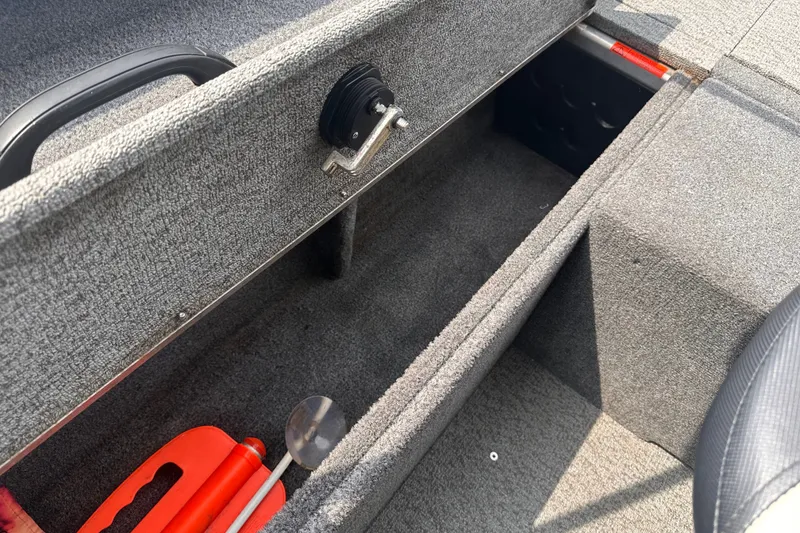 Slide: The Image of Interior storage compartment of a 2013 Alumacraft Competitor 185 Sport boat. - 22