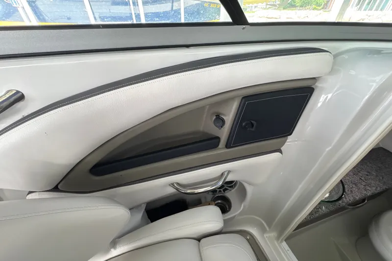 Slide: The Image of Interior view of a 2021 Crownline 290 SS boat, featuring sleek seating and modern design. - 21
