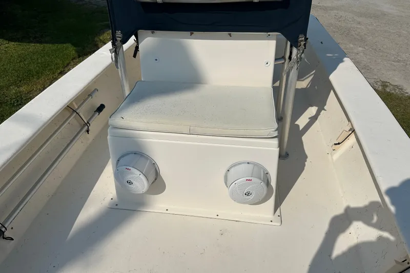 Slide: The Image of 2004 Jones Brothers Bateau 20 boat interior with seating and speakers. - 15