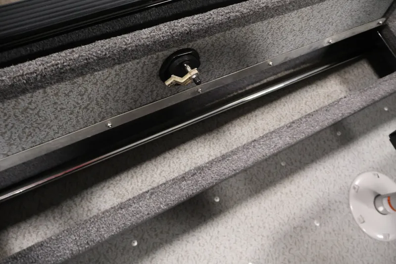 Slide: The Image of Interior view of 2020 Lund 1650 Angler SS boat storage compartment. - 32