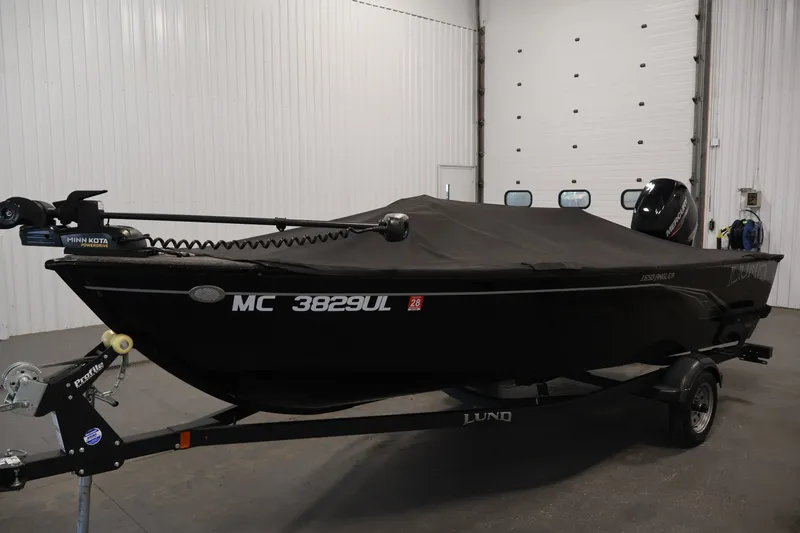 Slide: The Image of 2020 Lund 1650 Angler SS boat with cover in indoor storage. - 42