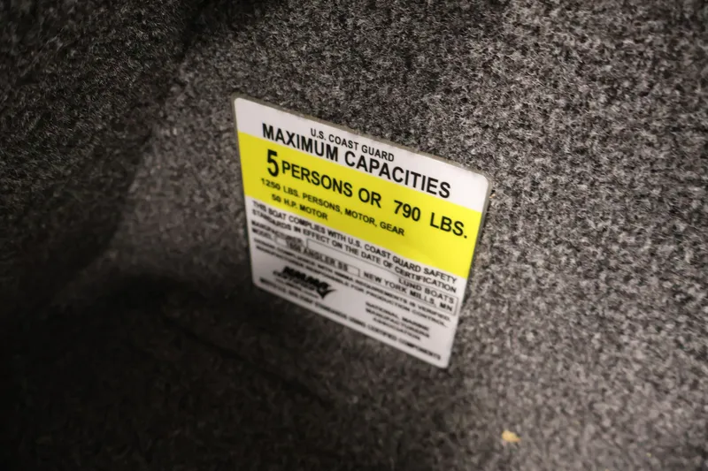 Slide: The Image of Capacity label on 2020 Lund 1650 Angler SS boat, indicating 5 persons or 790 lbs. - 28