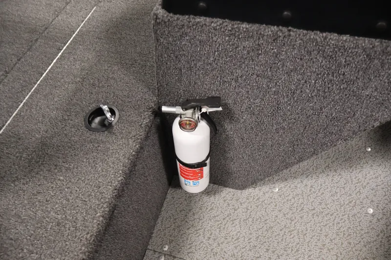 Slide: The Image of Fire extinguisher mounted on 2020 Lund 1650 Angler SS boat interior. - 21