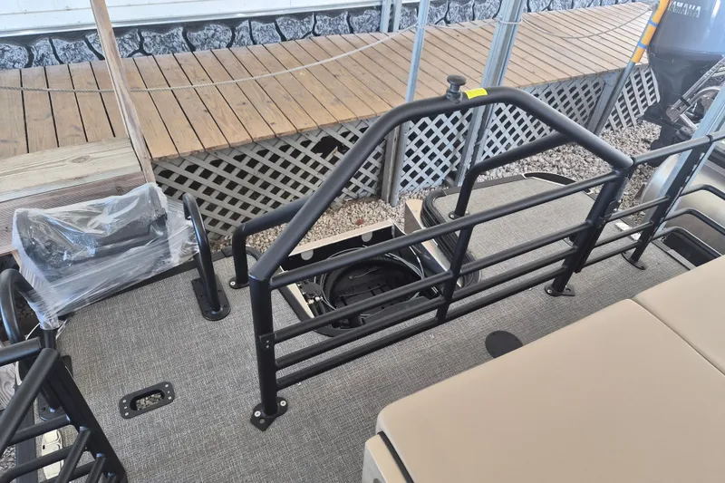 Slide: The Image of 2026 Sylvan X3 DLZ DH BAR pontoon boat with sleek railing and spacious deck. - 19