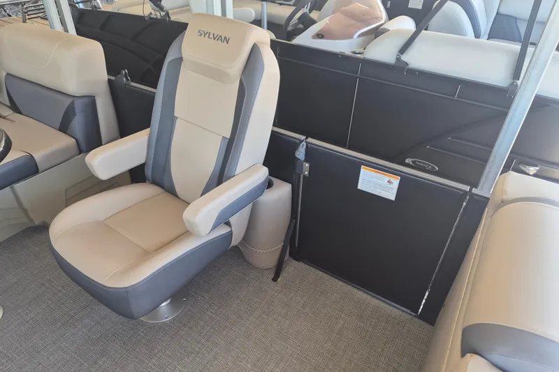 Slide: The Image of Luxurious interior of 2026 Sylvan X3 DLZ DH BAR pontoon boat with plush seating. - 9