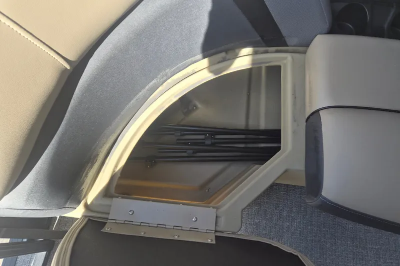 Slide: The Image of Storage compartment in 2026 Sylvan X3 DLZ DH BAR boat, featuring sleek interior design. - 5
